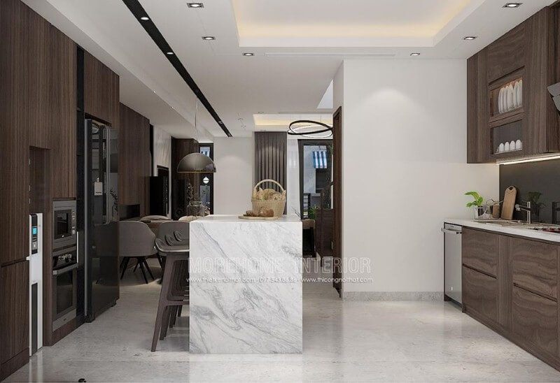 Tủ bếp gỗ An Cường sậm màu kết hợp bàn đảo ốp đá tạo nên vẻ đẹp sang trọng cuốn hút cho phòng bếp.