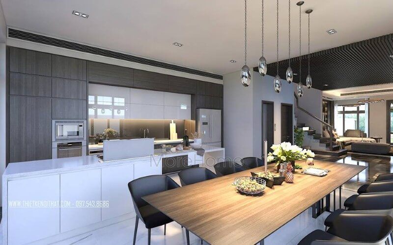 Bàn ăn gỗ nguyên tấm mộc mạc kết hợp đồ nội thất hiện đại sẽ là lựa chọn ấn tượng tạo nên không gian độc đáo cho phòng ăn liền bếp.